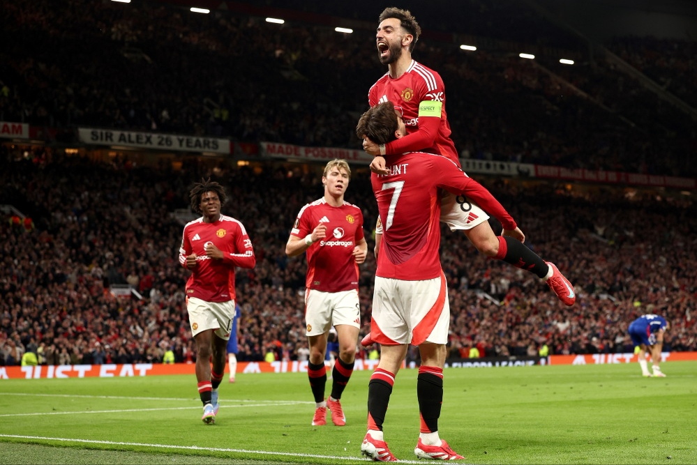 包含曼联客场3-1击败热刺，继续英超领跑的词条